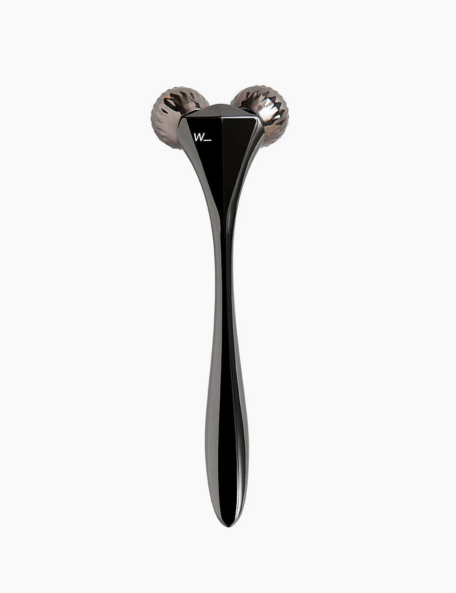 Steel coloured metal sculpting tool with faceted rollers to improve skin tone and circulation, boosting collagen production and for home facial treatments is a great luxury gift for the skincare junkie from Woods Copenhagen. (8544846676273)