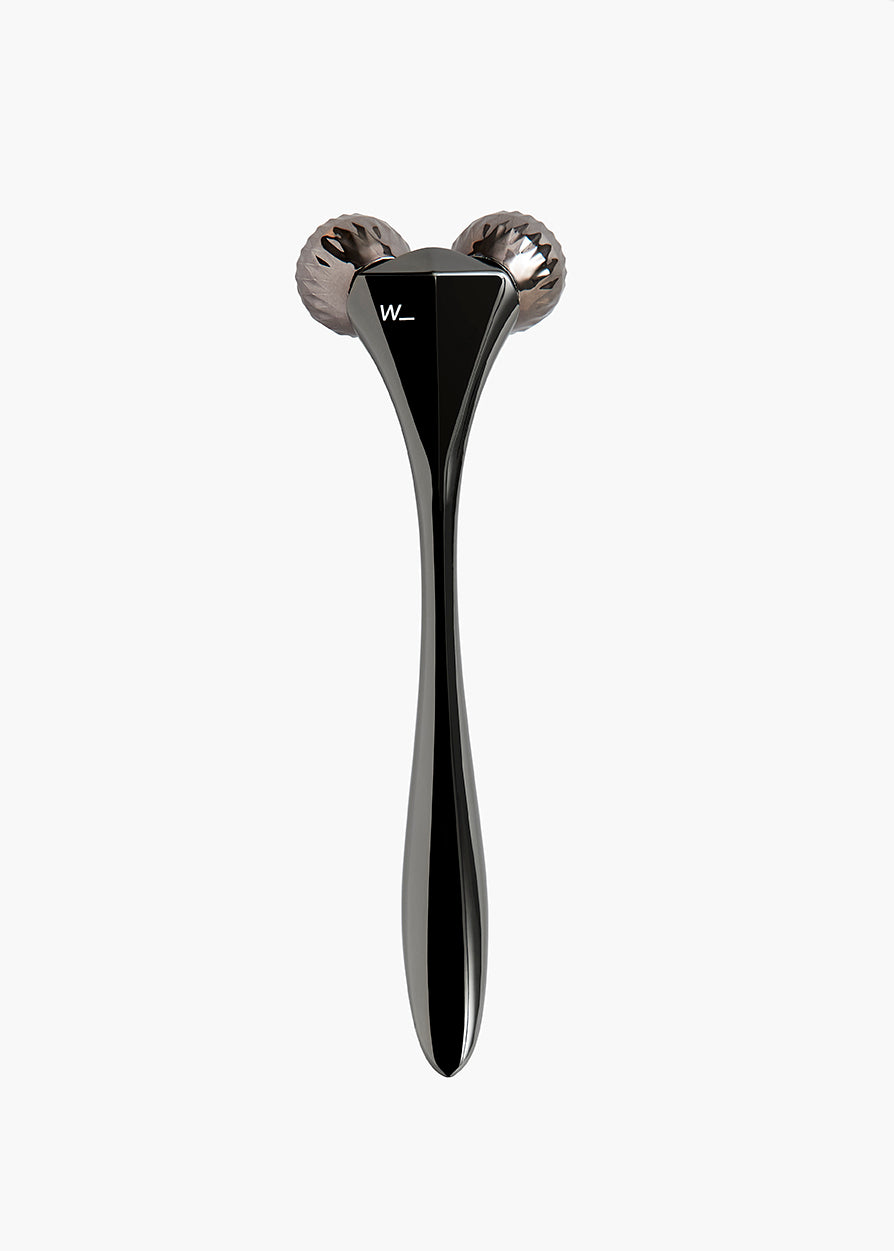 Steel coloured metal sculpting tool with faceted rollers to improve skin tone and circulation, boosting collagen production and for home facial treatments is a great luxury gift for the skincare junkie from Woods Copenhagen. (8544846676273)