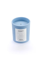 Signature blue candle in the same sky blue ceramic jar, inspired by Scandinavian skies, in the scent Kassett - a blend of fruits, foliage & flowers from Amoln, makers of Sweden's royal candles.