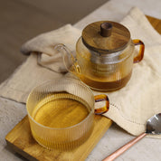 Glass teapot with glass cup