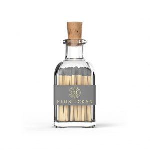 Grey coloured matches in a stylish glass bottle from Eldstickan for a great interior design idea