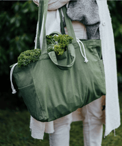 useful tote bag in organic cotton with both long & short handles and a wide shape with additional pockets. Great for yoga mats, beach towels and shopping, from Swedish brand OMOM