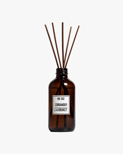 All natural, organic and vegan room diffuser in amber glass with the green mint scent of Coriander from the best of Sweden's coastal home fragrance brand, L:A Bruket