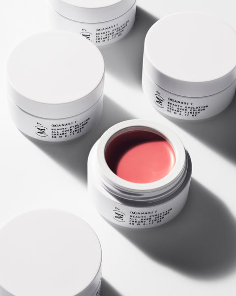Soft neutral orange tones of multi use natural and organic lip cheek & eye colour in minimalist white pots from Swedish make up brand Manasi7