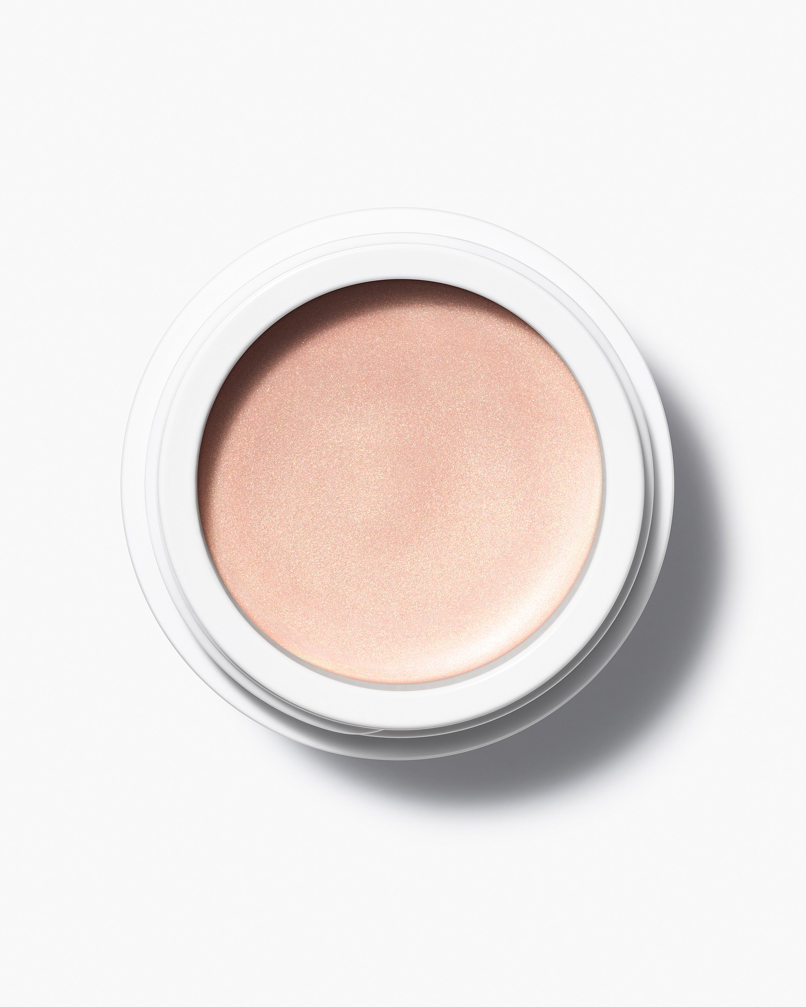 Soft peachy pearly pink tones of multi use natural and organic highlighter for all skins in minimalist white pots from Swedish make up brand Manasi7 