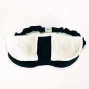 Great for yoga or on the plane, our black silk sleep mask with pockets containing organic lavender flowers or chamomile flowers for aromatherapy benefits. Soopz Paris