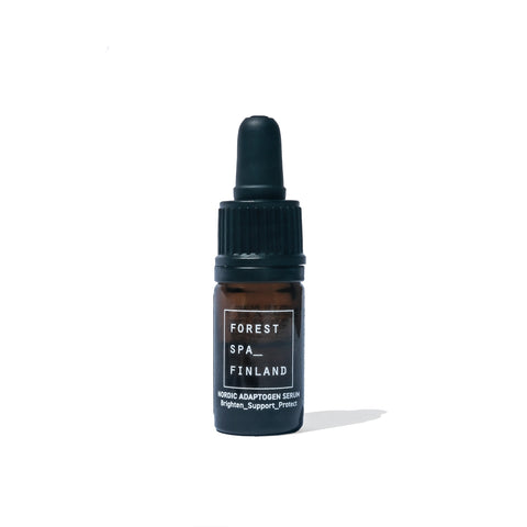 Mini trial sized black glass dropper bottle full of active Nordic Adaptogens for the skin to brighten, support and protect direct from Forest Spa Finland.