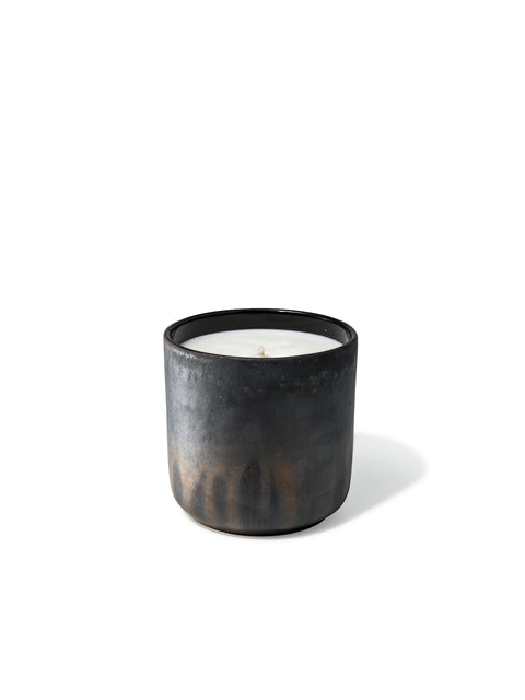 Elegant design and natural sophisticated scent of black wood in this refillable ceramic candle in unique textured finish from Quod Stockholm, perfect for any home