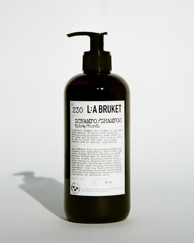 Natural, vegan & organic shampoo with the forest scent of birch in brown pump bottle from the nature of Sweden's West Coast by best selling minimalist L:A Bruket