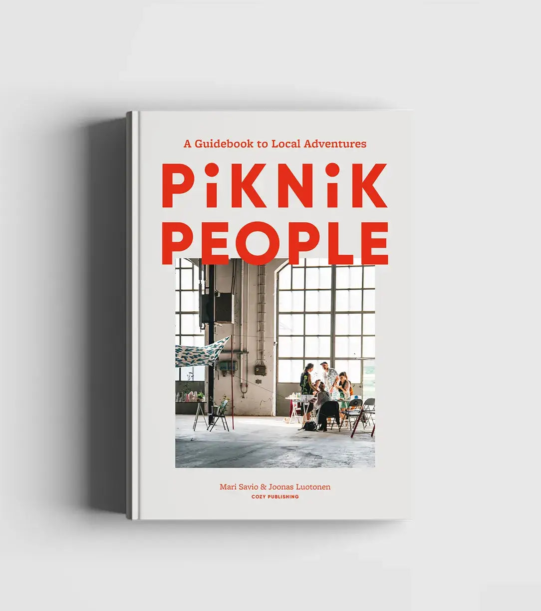 Hardcover book celebrating the lifestyle of eating and living out in nature family, enjoying simple crafts &  picnics with beautiful photography of Finnish life in Piknik People by Cozy Publishing.