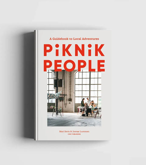 Hardcover book celebrating the lifestyle of eating and living out in nature family, enjoying simple crafts &  picnics with beautiful photography of Finnish life in Piknik People by Cozy Publishing.
